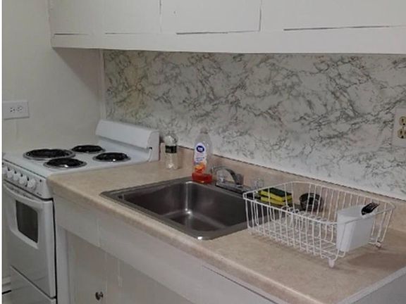 Galley kitchen.