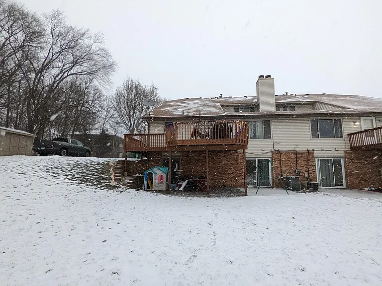 Deck and basement walkout sliding door with patio