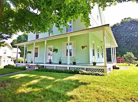 Original farm house to Spring Street with its gorgeous wrap around front porch.