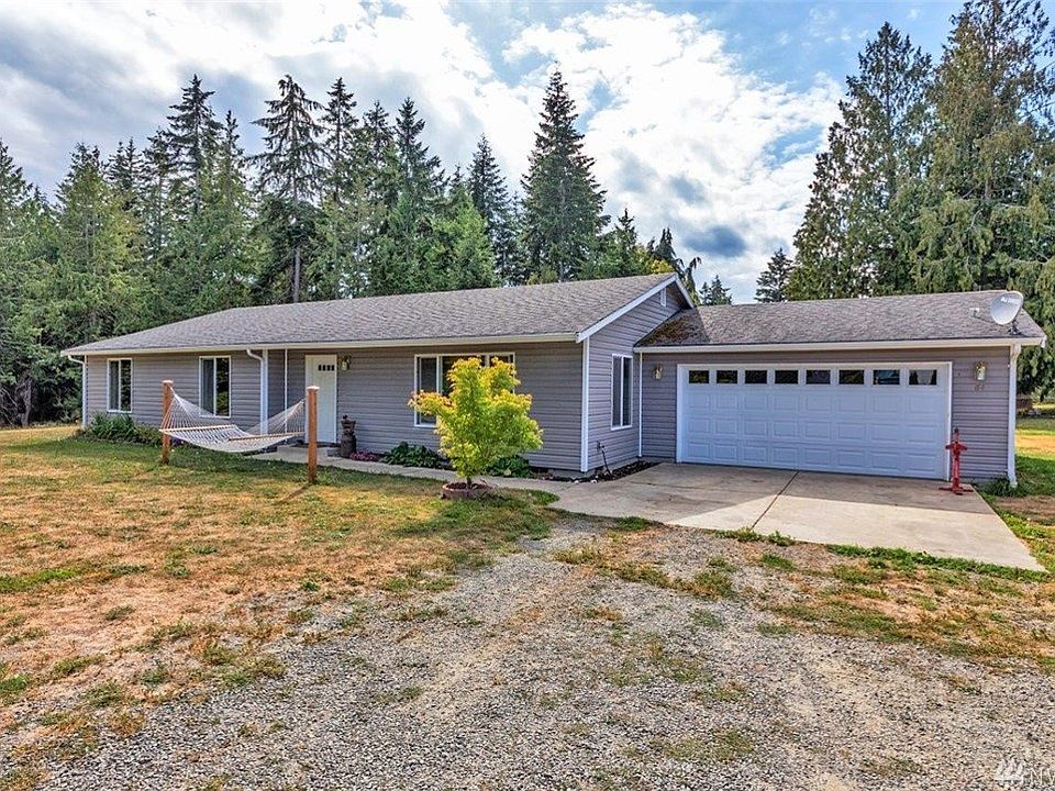 Welcome to a freshly painted interior, pressure washed, low maintenance exterior, recently stained fence and move-in ready home on 1.69 aces, minutes from Port Townsend.