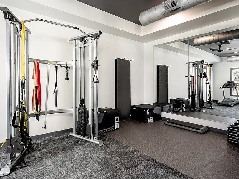 24-Hour Cardio and Strength Training Fitness Center featuring Peloton Bike, Hub Training System, Water Rower, Free Weights and More!