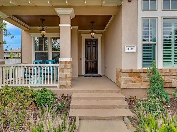 Spacious covered front porch greets you as you approach the home