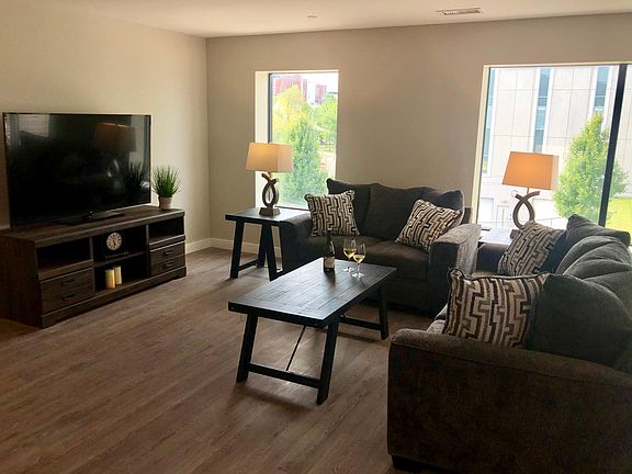 Oversized windows overlooking Veteran's Park.