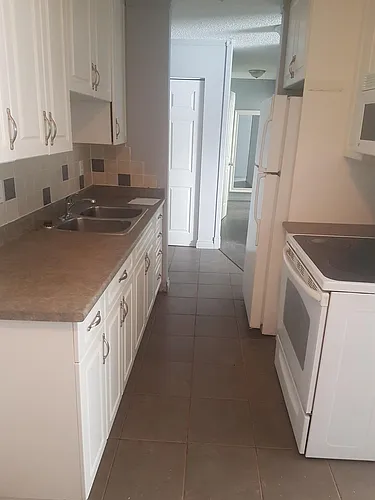 8640 106th Ave NW #102 Photo 1