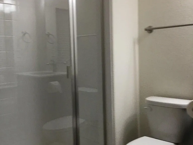 Basement bathroom 3/4, with window for natural light