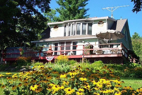 lakeside of house fr lower flower garden
