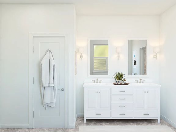 Primary bath with freestanding vanity and brushed nickel finishes