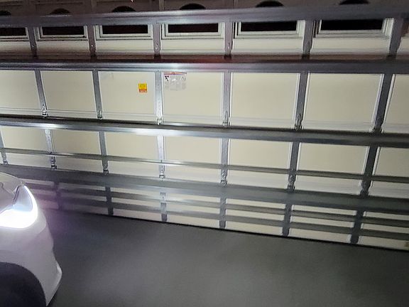 Storm braces on garage doors