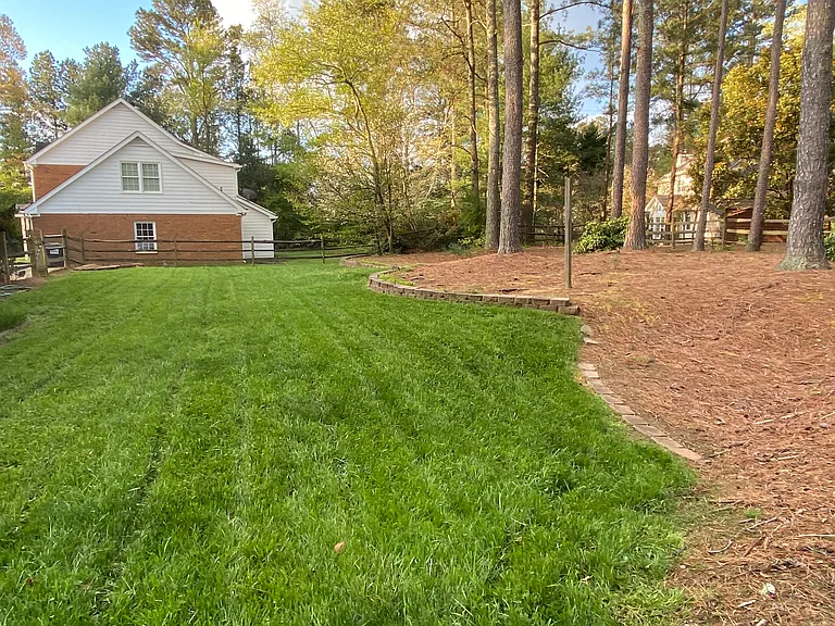 A backyard featuring a playset