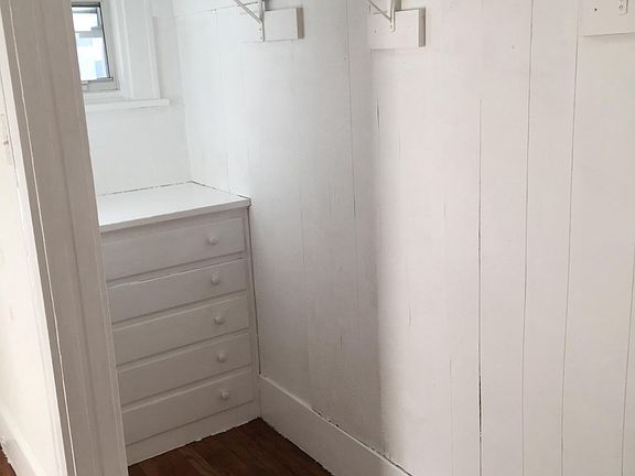 Large closet equipped with freshly painted built in chest of