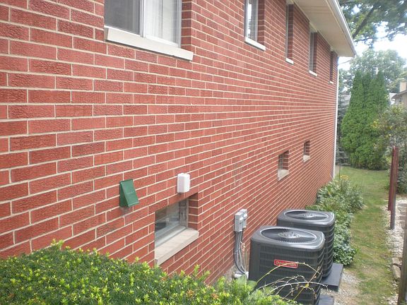 Side of home with central air