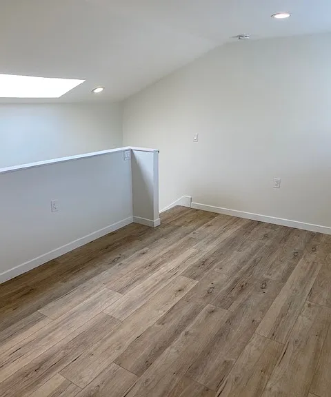 Loft bedroom is open to the staircase