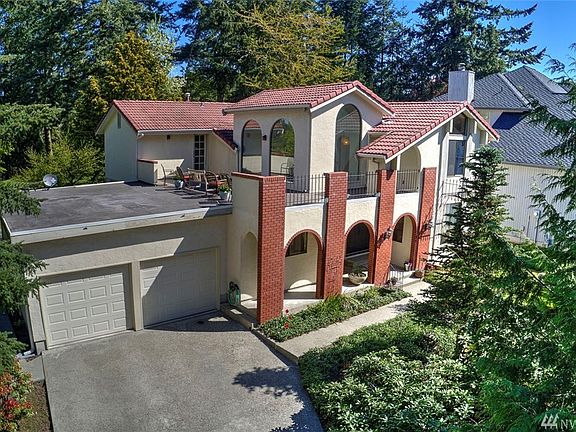 The master suite provides stunning views, gorgeous architectural details, an ensuite bath and door to the sprawling rooftop deck offering unparalleled views. Three additional guestrooms on the upper floor and a charming balcony overlooking the lower floor add to the wonderful feel of this home. You'll appreciate the 2-car garage with built-in work bench and storage. Fairwood amenities include 24/7 security patrol, parks, quiet streets and award-winning Kent Schools. Enjoy neighborhood sponsored events and easy access to freeways, airport, hospital, major retail, dining and business hubs.