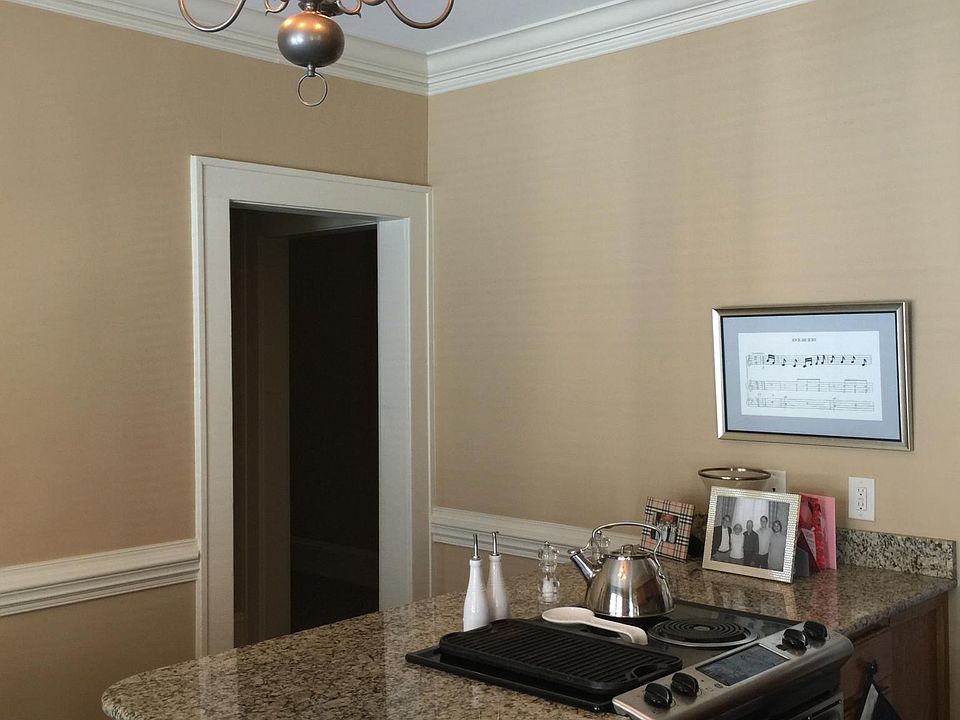 granite top kitchen island and electric stove