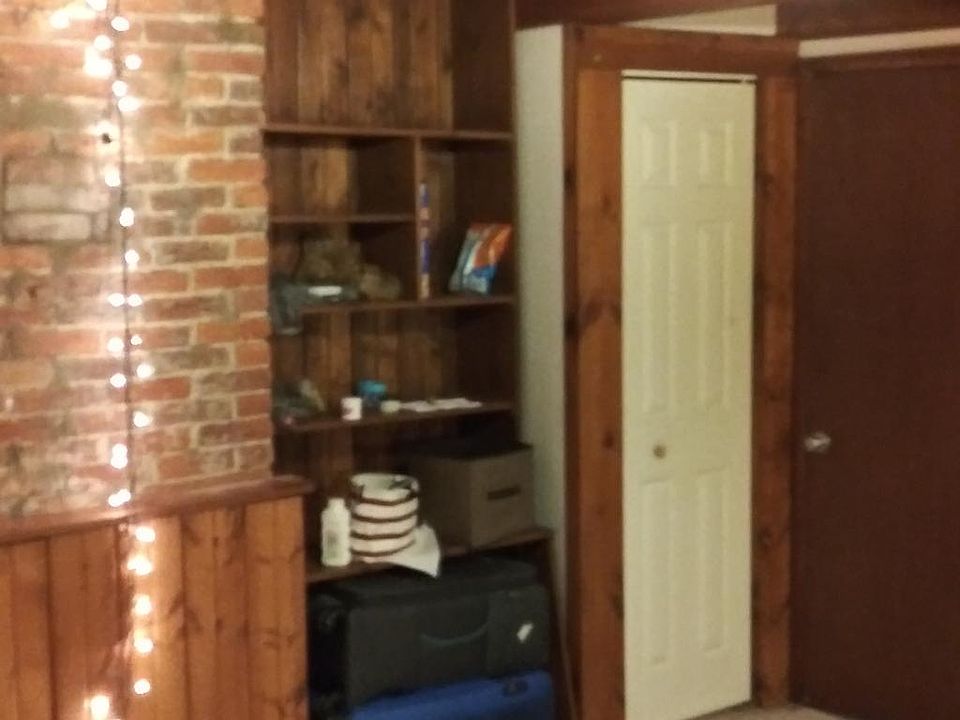 Vaulted ceiling; exposed brick