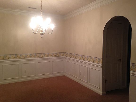 Dining Room with arched door