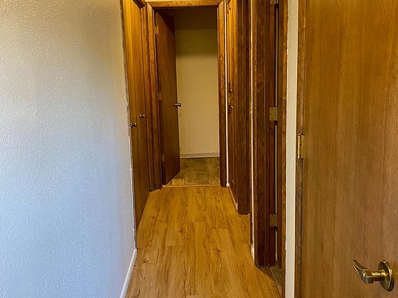 Hallway to bedrooms and bathroom.