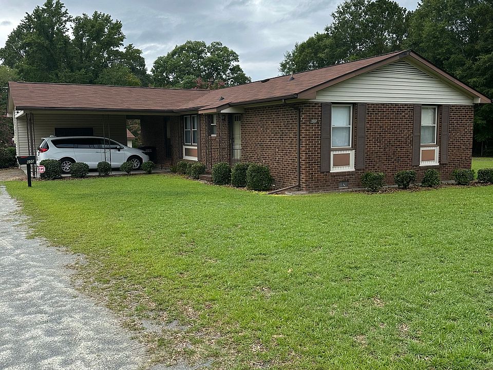 Brick Ranch w/ 2 car carport