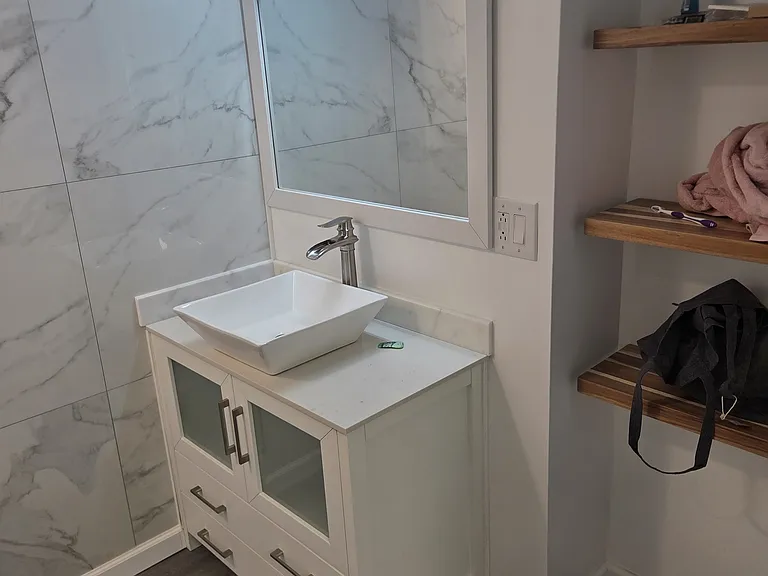 1st bathroom on the basement floor.