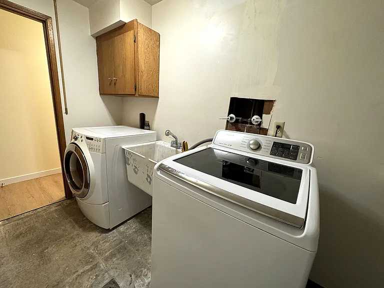 Full size washer and dryer lower level