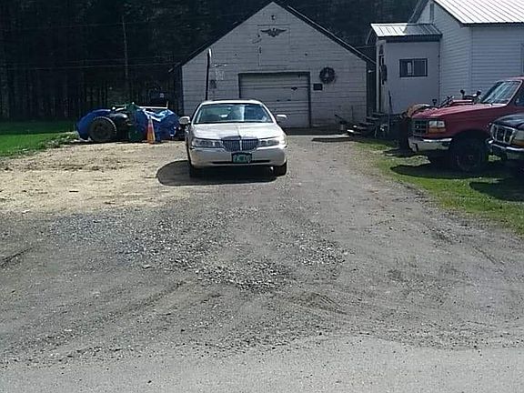 9 car parking. Large garage.