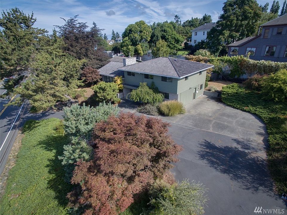 Solid house built in the 60's sitting on 4 lots.