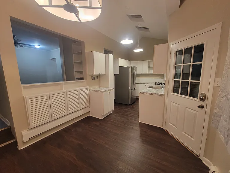 Dining Room and Kitchen plus back exit to parking