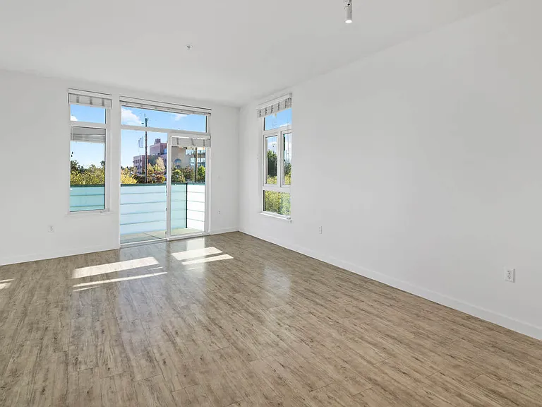 Living Room with Balcony and Hard Surface Flooring