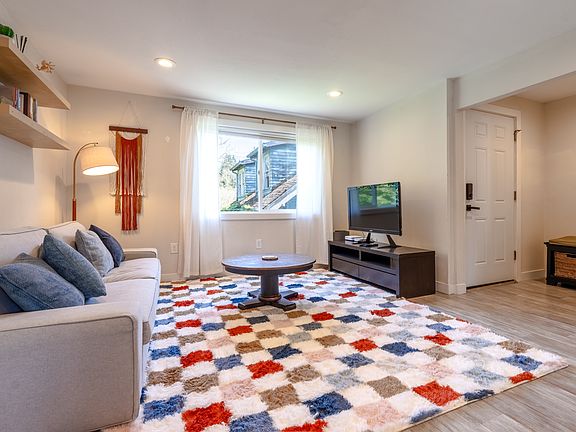 Living room with front entrance view