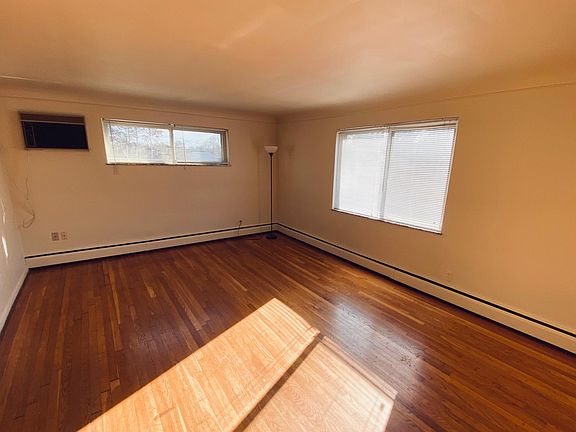 Large 13 x 18 living room. Beautiful hardwood floors.