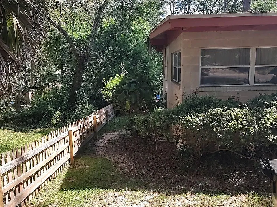 Side yard and fence.