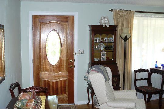 The front door opens into the large living room.