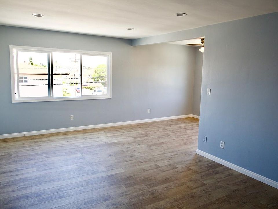 Living Room. New hardwood floors and new windows throughout.