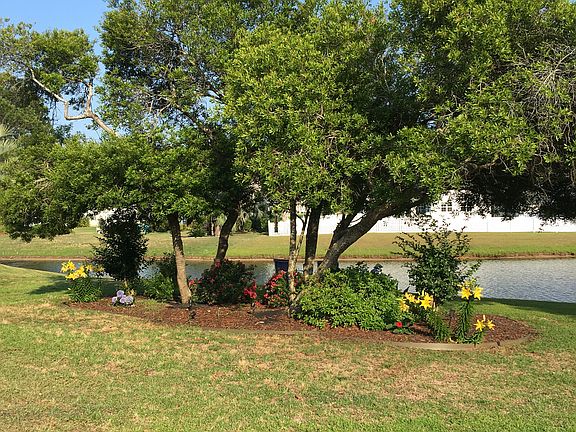 Backyard adjoins lake