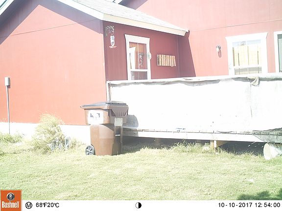 Rear of home with large deck