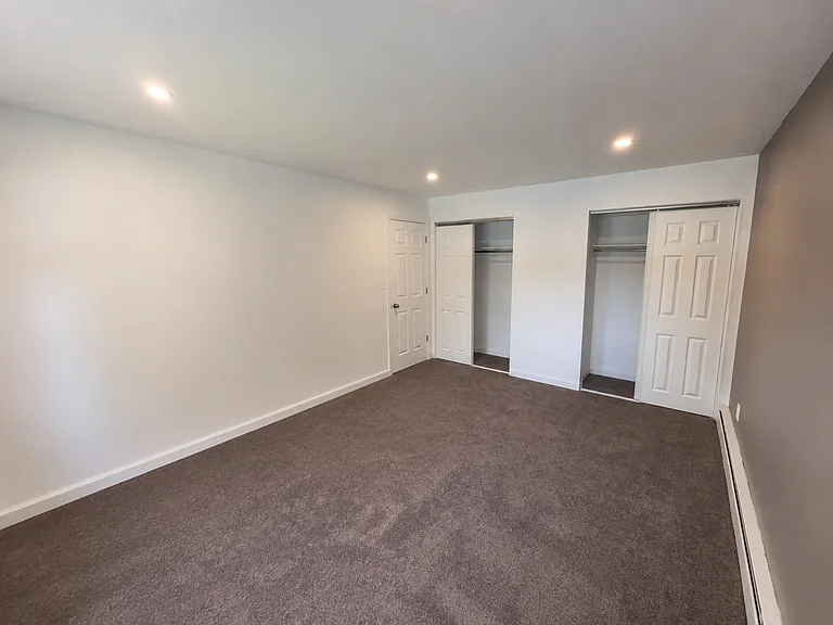 Primary bedroom with 2 closets