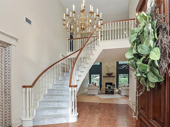 This home has transitional architectural features w/contemporary amenitiesâperfect for any design style. Beautiful brass chandelier provides a perfect entrance with a breath-taking view of oasis back yard!
