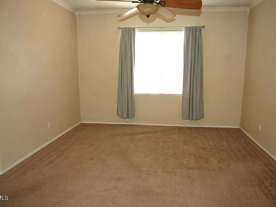 1st image of 13014 W Surrey Ave #1