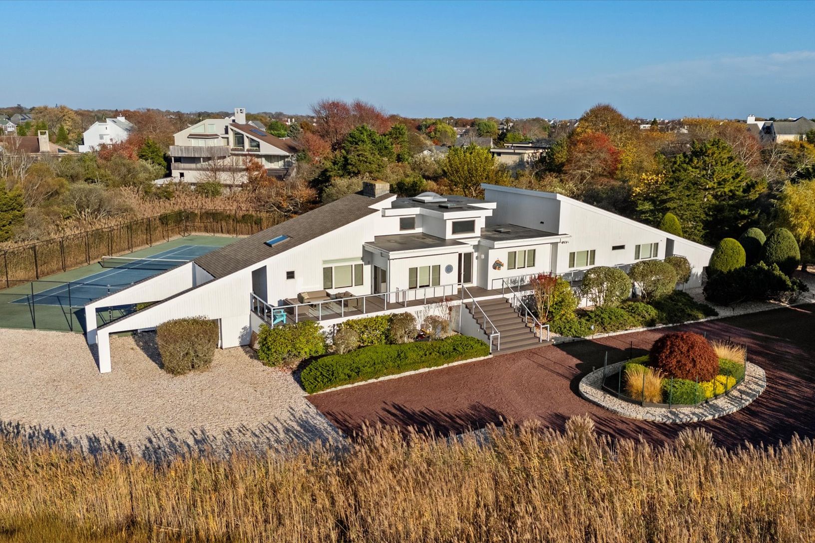  Aerial view of this tucked away acre Hampton retreat