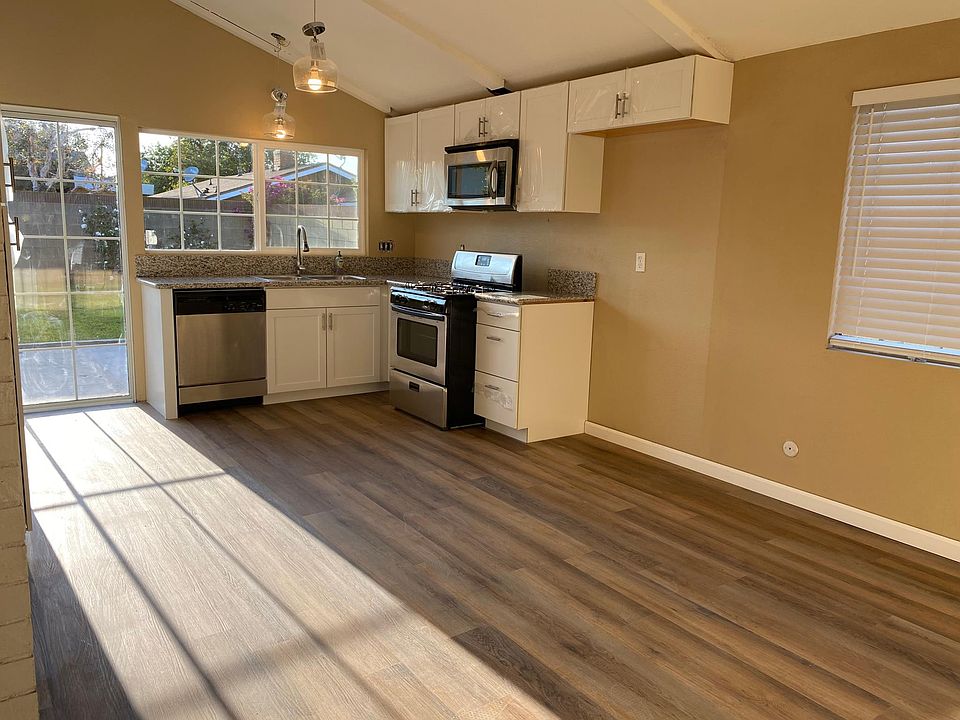 All new floors, granite counter tops and stainless steel sink.