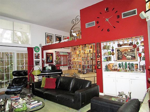 Upon walking into the home you will notice the soaring open concept ceilings and abundant natural light that flows through out t