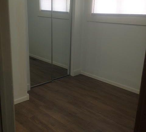 New floors throughout, mirrored doors in 3 of the bedrooms,