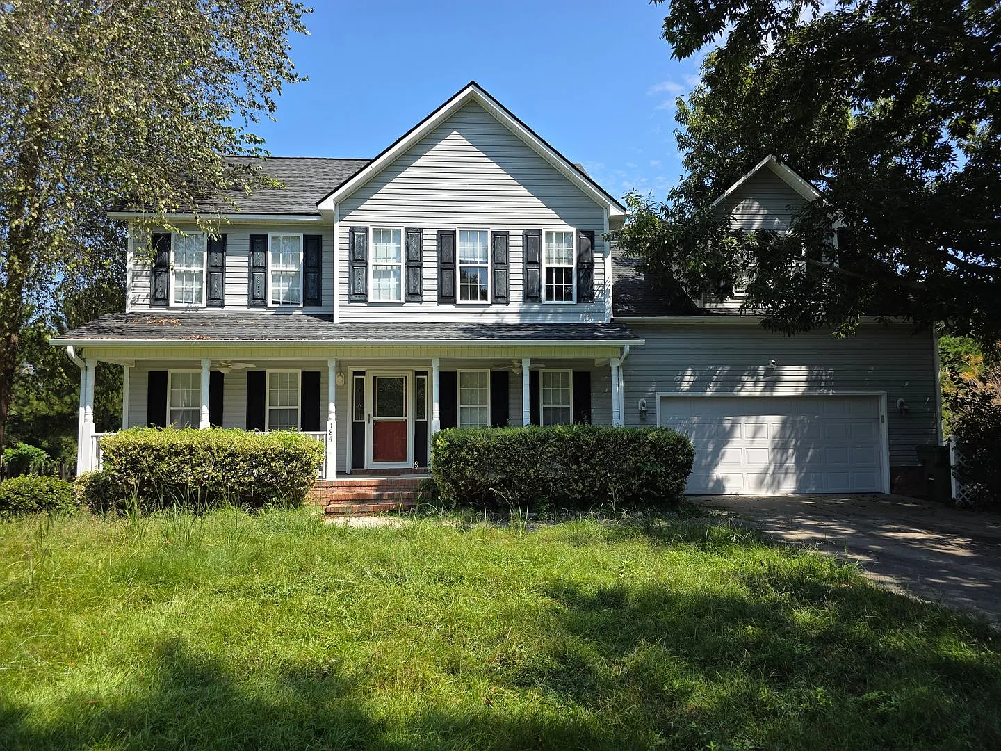 Peaceful Pond-Side Living with Spacious Interiors & Bonus Room — Photo 1