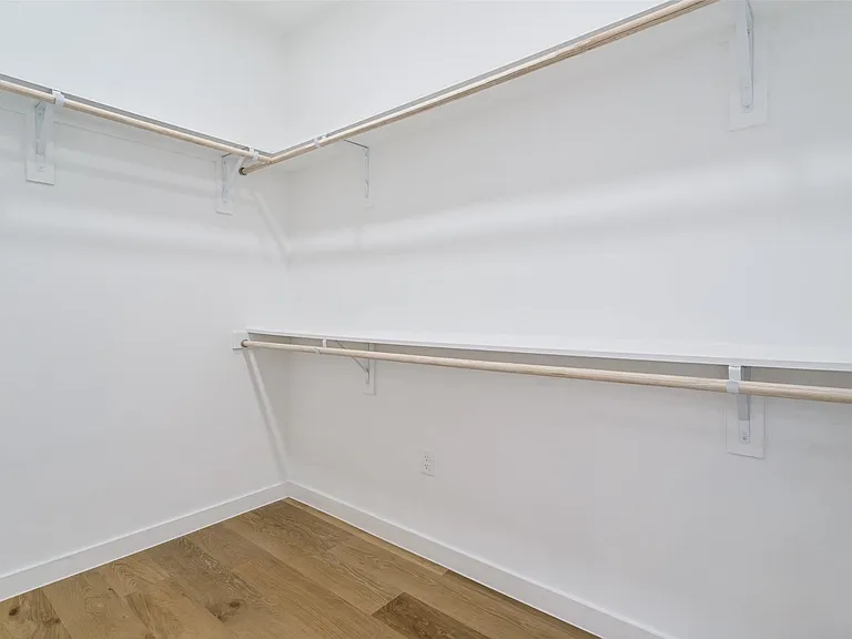 Large walk in closet. (2nd floor primary bathroom)