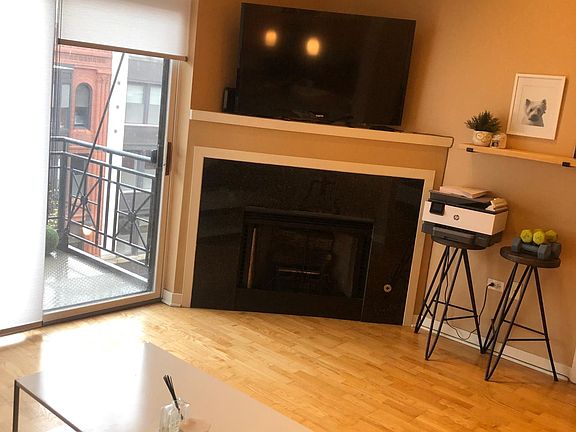 Gas Fireplace and Balcony