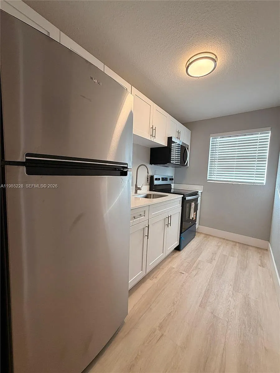 Building Photo - 1258 NW 61st St #4