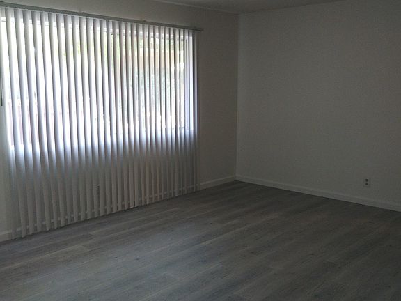 Big Living Room with Vertical Blinds