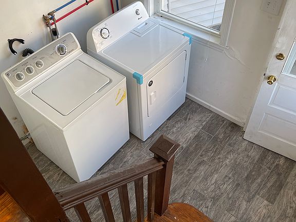 Washer and Dryer from the private steps going up to the unit
