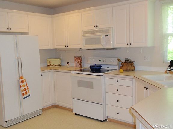 5th image of 9763 Ebbtide Ln NW