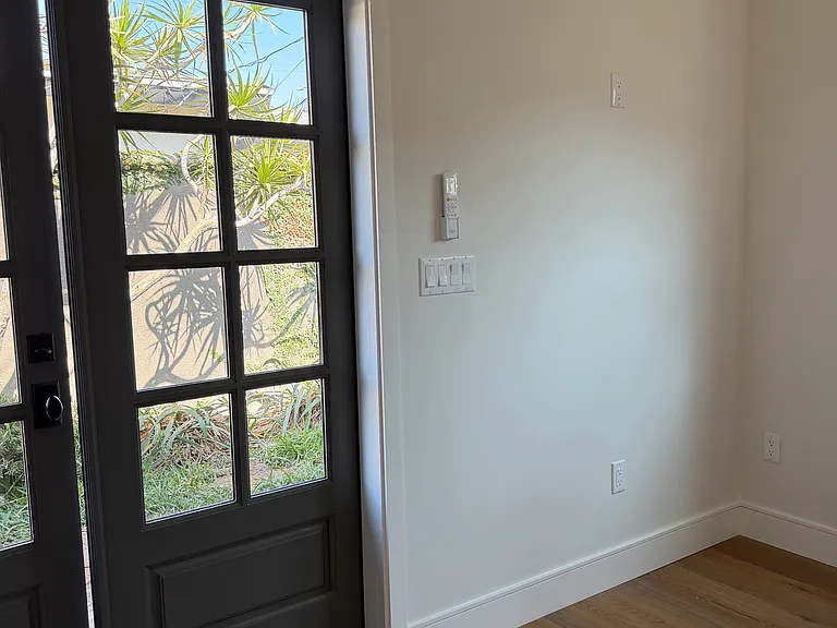 French Doors / Entry Way and raised plugs for TV